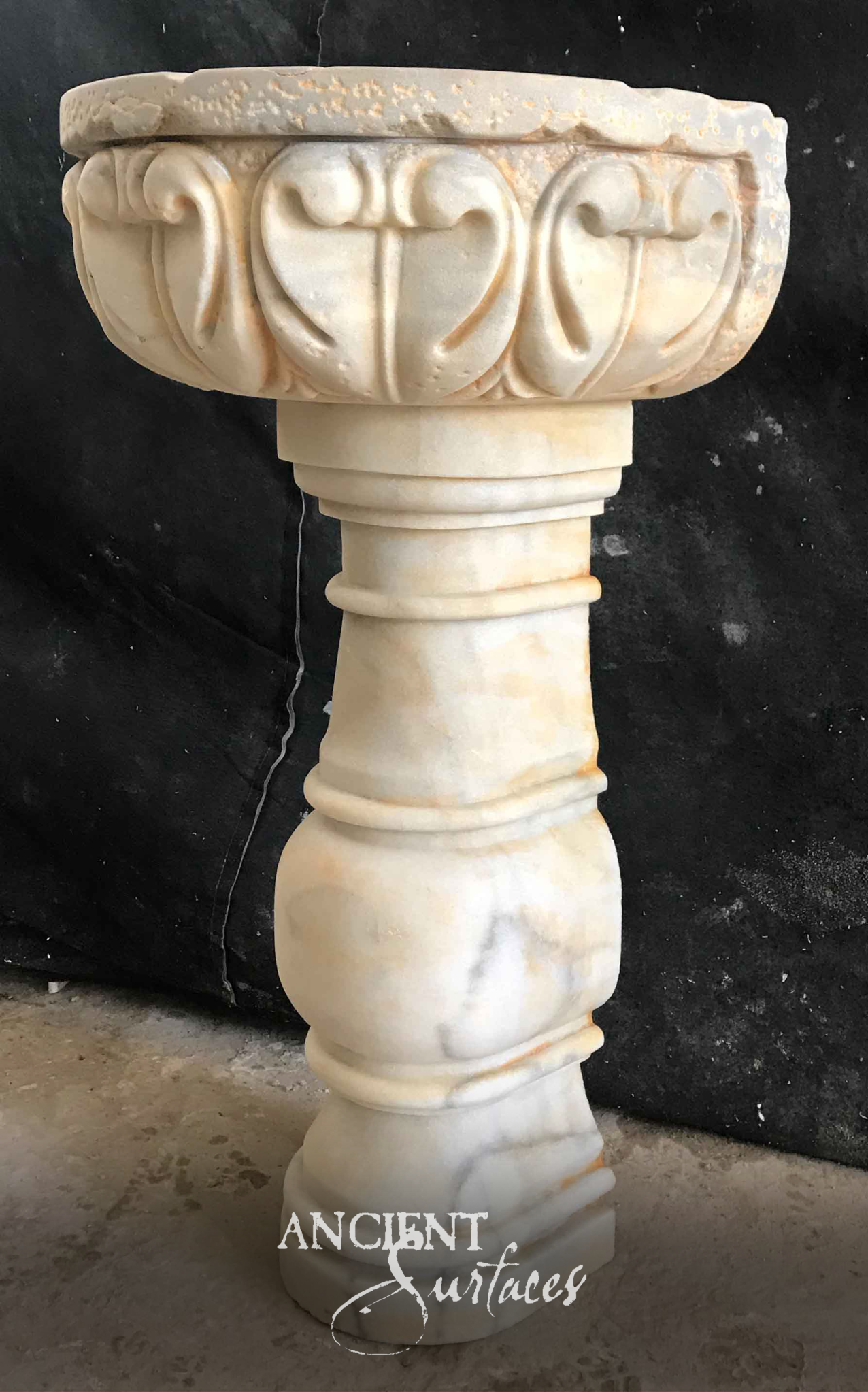 Hand-carved antique marble pedestal sink